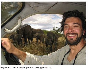 Clint Schipper, with elephants outside his window